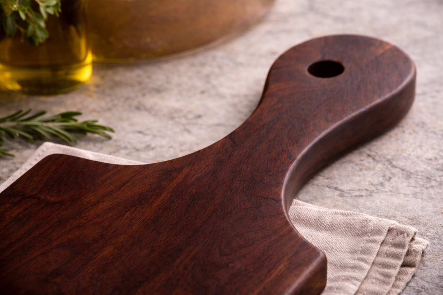 Close-up of rich walnut wood grain on handcrafted serving board